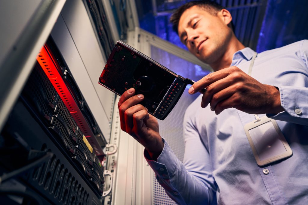 data center it technician examining new hdd 2022 01 19 00 11 23 utc 1